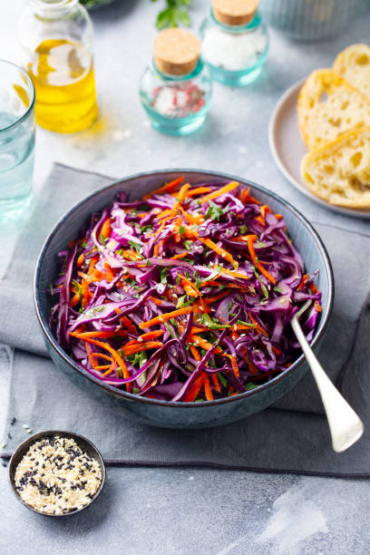 istock Red cabbage salad. Coleslaw in a bowl. Grey background. 1171643785