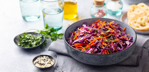 istock Red cabbage salad. Coleslaw in a bowl. Grey background. 1171643854