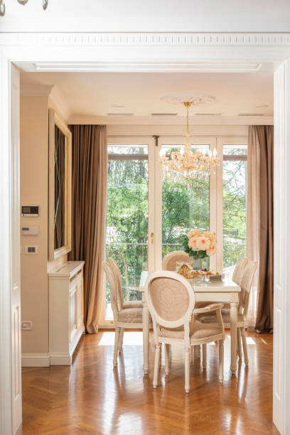 istock Decorated modern dining room, kitchen. Homemade dessert, apple pie with blueberries  ready to serve. 1171647789