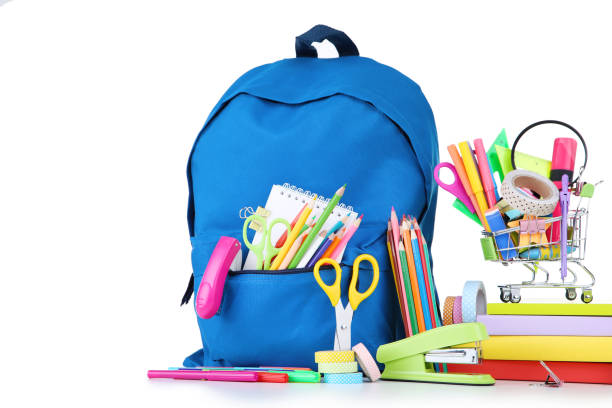istock School supplies with blue backpack on white background 1171650397