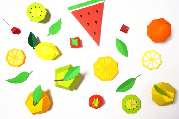 istock exotic fruit made of paper on white background. 1171652092