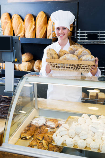 istock Bakery female employee with tasty 1171652781