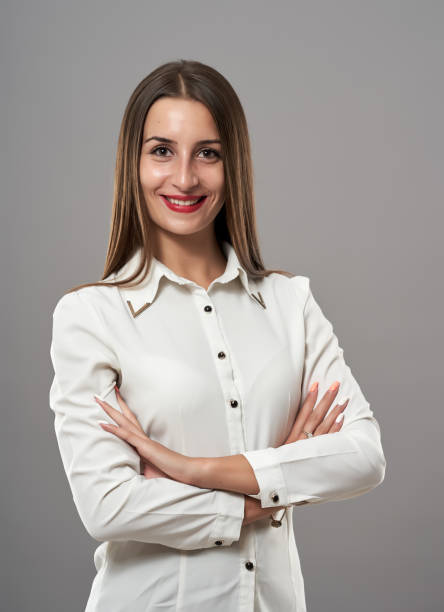 istock Young businesswoman on gray background 1171653306