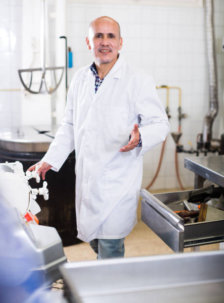 istock Adult male standing in production workshop 1171653424