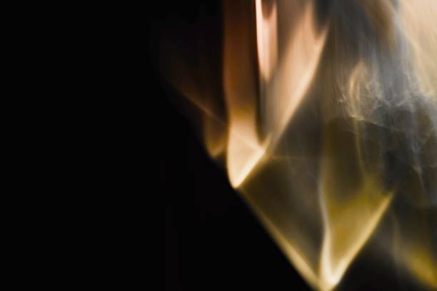 istock Abstract blurred golden smoke and light 1171655620