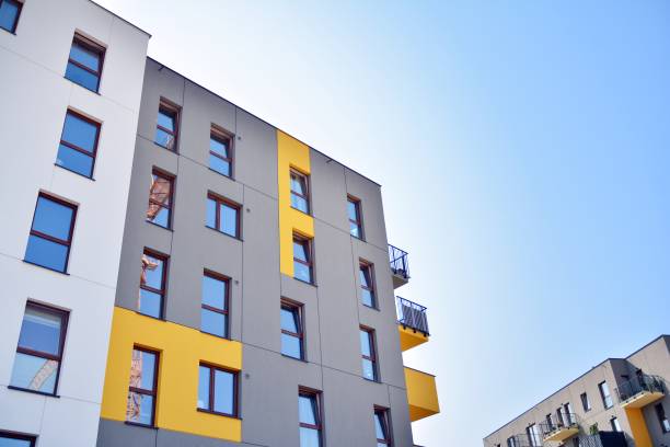 istock Modern apartment buildings on a sunny day with a blue sky. 1171655739