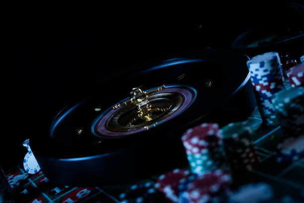 istock Poker Chips with roulette, gambling games concept. 1171658573