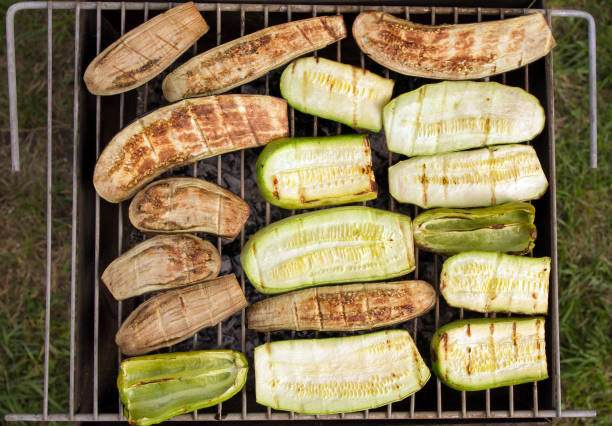istock Vegetables On Barbecue Rack. Picnic. Grilling Outdoors At Summer Weekend. Barbecued Fresh Vegetables With Eggplant And Zucchini 1171670511