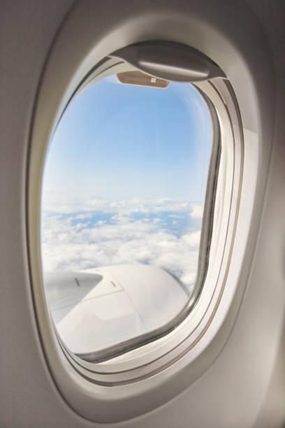 istock Open window with sky on a comercial aeroplane. Cabin interior 1171672218