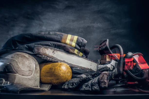 istock Safety gear, oxygen balon and chainsaw on the table 1171673048