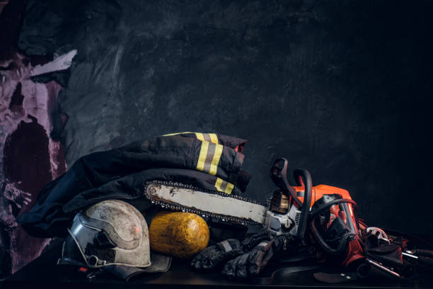 istock Safety gear, oxygen balon and chainsaw on the table 1171673654