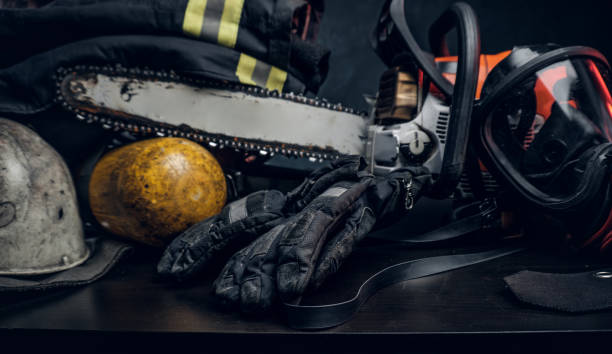 istock Safety unform on the table with respirator and chainsaw. 1171674495