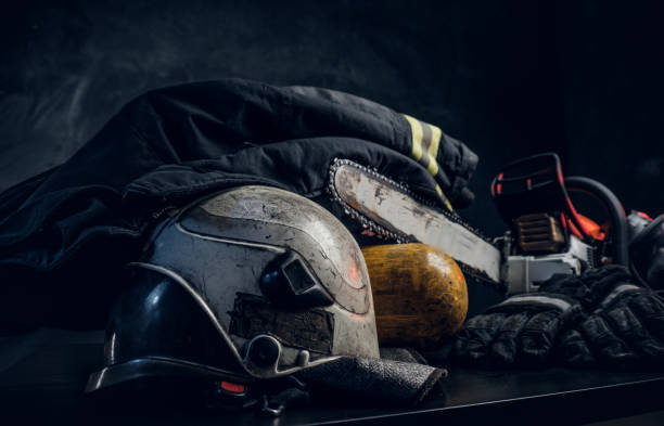 istock Safety gear, helmet, oxygen balon and chainsaw 1171674699