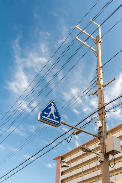 istock Traffic sign with blue sky and electric wire 1171674722