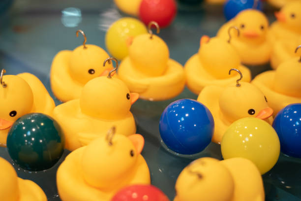 istock Rubber ducks in water pool for carnival games 1171675750