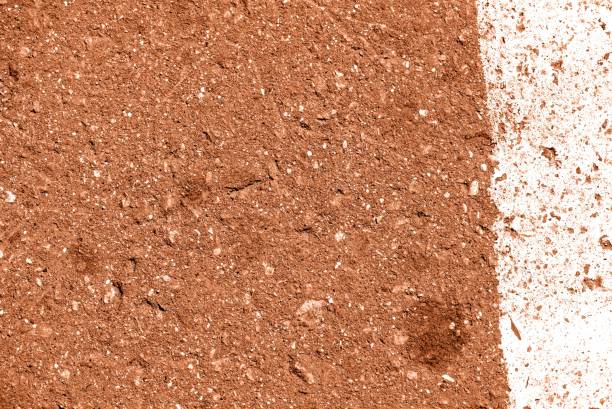 istock Old dirty asphalt surface with white paint on it brown color toned 1171679545