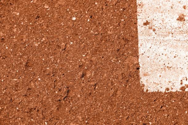 istock Old dirty asphalt surface with white paint on it brown color toned 1171679548