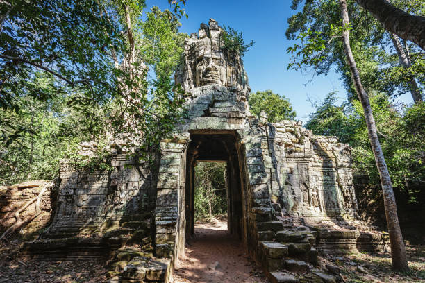 Impressive Old Stone Entrance with Stone Sculpture on Top of the Gate at Angkor Thom. Angkor Thom, Angkor Wat, Cambodia, South East Asia.
