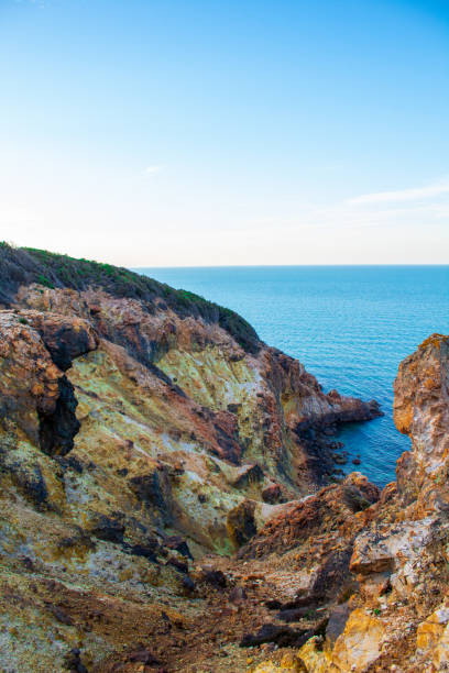 Exotic cliff rock, background sea Light brown color rocks and cliff, waves hitting the rocks lagün stock pictures, royalty-free photos & images