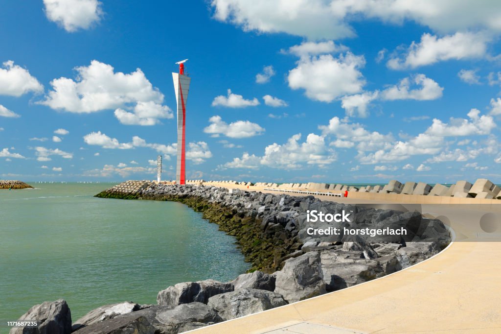 Pier with Harbor Control Tower, Ostend, Belgium Modern harbor control tower at the port entrance of ostend, belgium Ostend Stock Photo