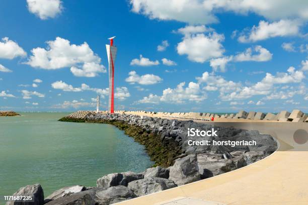 Pier With Harbor Control Tower Ostend Belgium Stock Photo - Download Image Now - Ostend, Tower, Beach