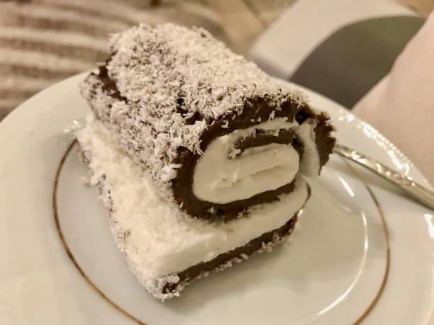 istock Turkish Dessert Saray Sarma / Chocolate pudding with cream and coconut powder. 1171691889
