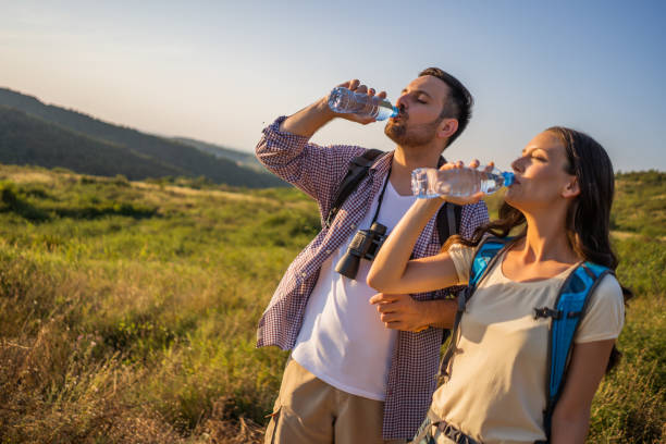 istock Young couple is hiking in mountain in summertime 1171692029
