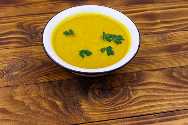 istock Pumpkin soup on a wooden table 1171693253