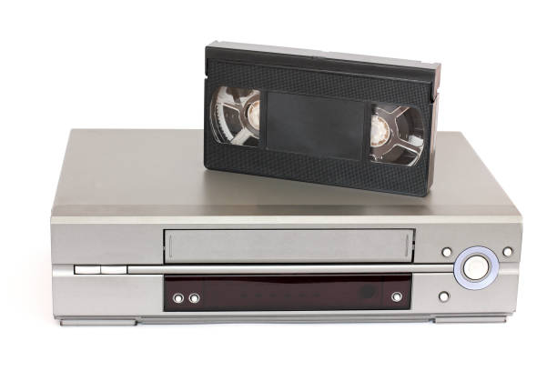 istock Videocassette and VCR on a white background 1171693679