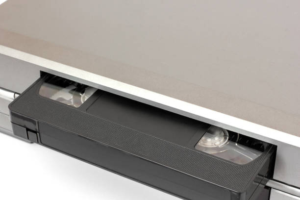 istock Videocassette and VCR on a white background 1171693718