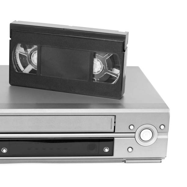 istock Videocassette and VCR on a white background 1171693825