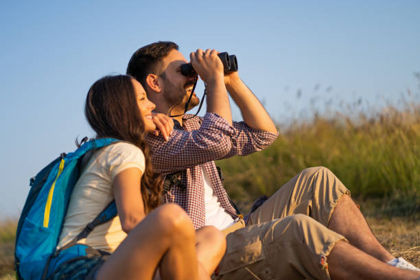 istock Young couple is hiking in mountain in summertime 1171694385