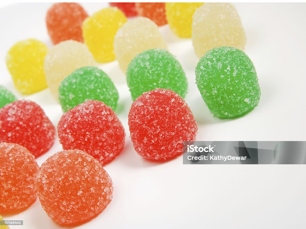 Colorato rosso giallo e bianco Gumdrops Arancio verde - Foto stock royalty-free di Arancione