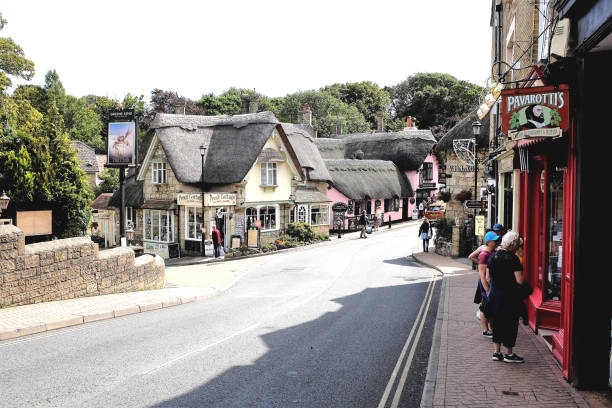 Shanklin, Isle of Wight, UK. August 15, 2019. Tourists and holidaymakers browsing the shops and beautiful old thatched village at Shanklin on the Isle of Wight, UK.