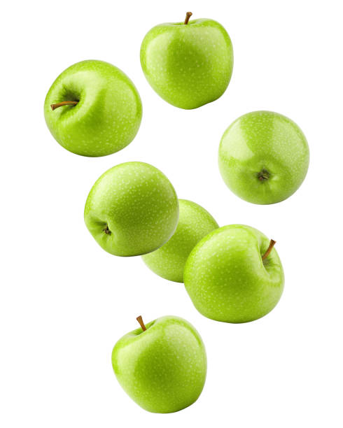 istock Falling green juicy apple isolated on white background, clipping path, full depth of field 1171699449