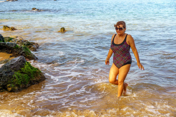 istock Senior Hispanic woman on Maui beach 1171700204