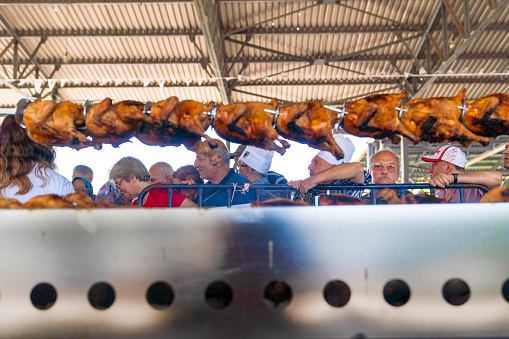 Mengen, Bolu/Turkey - August 03 2019 :  34 nd Mengen Culinary and Tourism Festival (34. Mengen Ascilik ve Turizm Festivali in Turkish).  Longest chicken flipping Guinness record attempt. Free chicken.