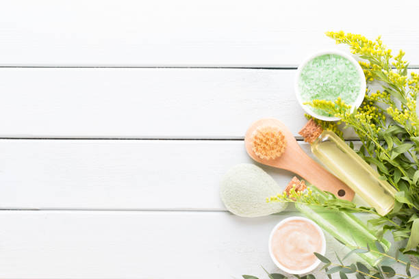istock Beauty and aromatherapy concept with spa set on pastel rustic wooden background. 1171700455