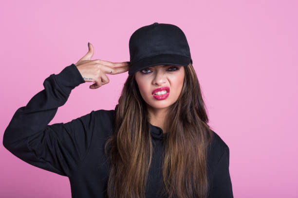 istock Young asian woman making suicide gesture 1171700690