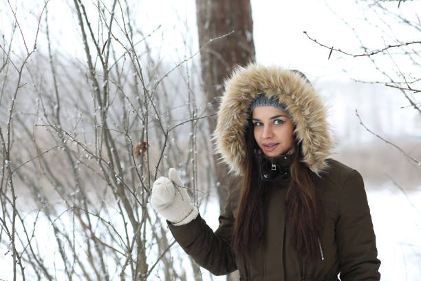 istock Beautiful girl in a beautiful winter park 1171700767