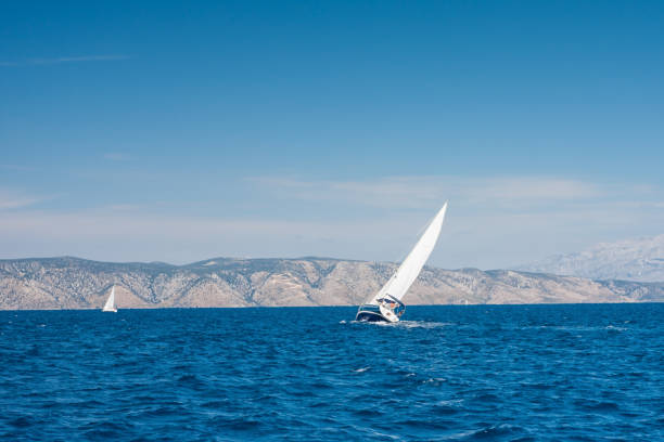 luxury big white sailing yachts at the sea