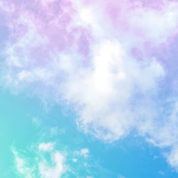 istock Teal blue and purple sky with white clouds, toned 1171712167