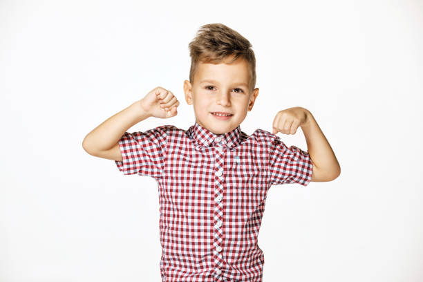 istock handsome boy in shirt on white background 1171712426