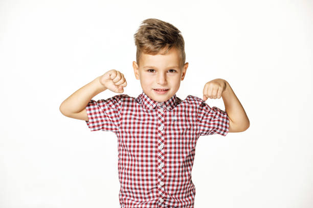 istock handsome boy in shirt on white background 1171712485