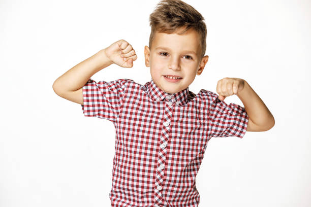 istock handsome boy in shirt on white background 1171712549