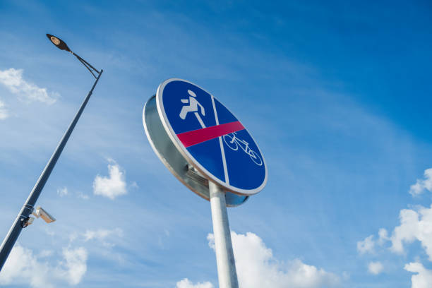 road signs, sunny day, sky background