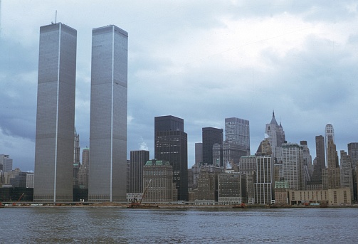 New York City, NY, USA, 1974. Manhattan skyline with the old Wold Trade Center (twin towers). Seen from the Hudson River.