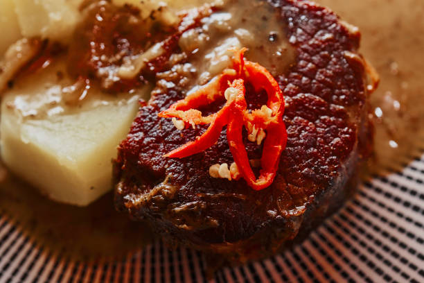 istock Fried roast beef with fresh hot red chili pepper 1171716724