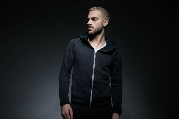 istock dramatic sporty man looks to side 1171717561