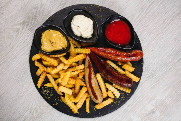 Looking down on a plate with eaten fast food